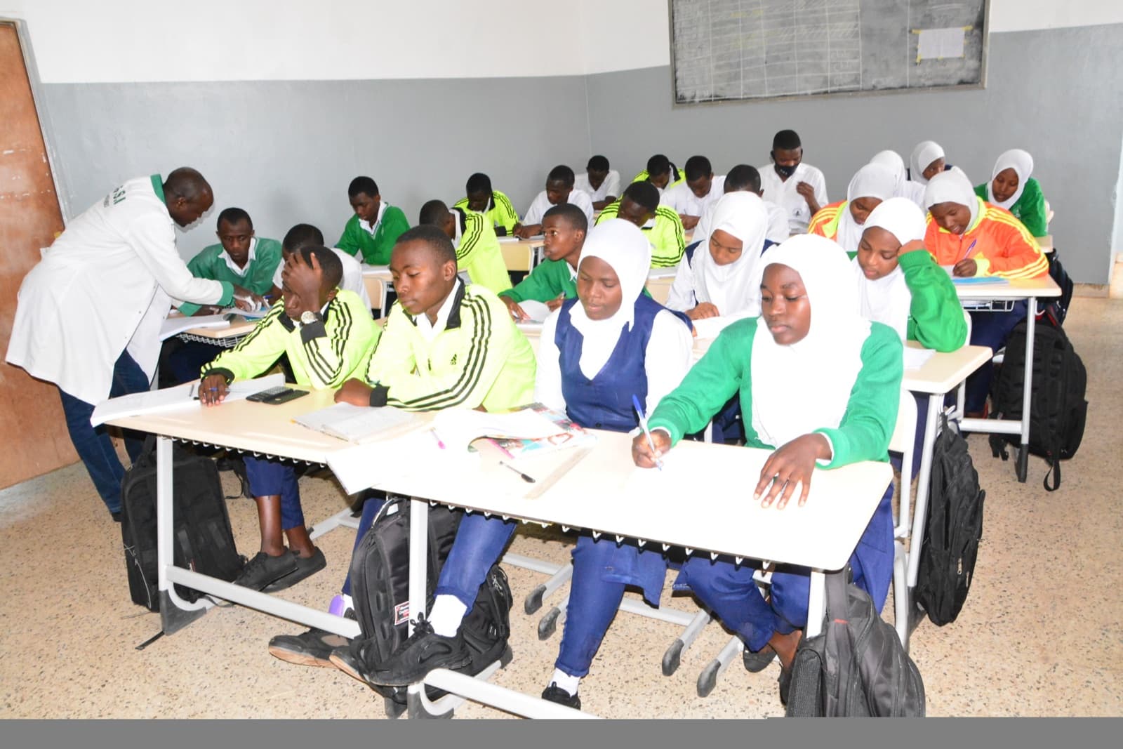 Students at work during a lesson at ESSI Nyamirambo