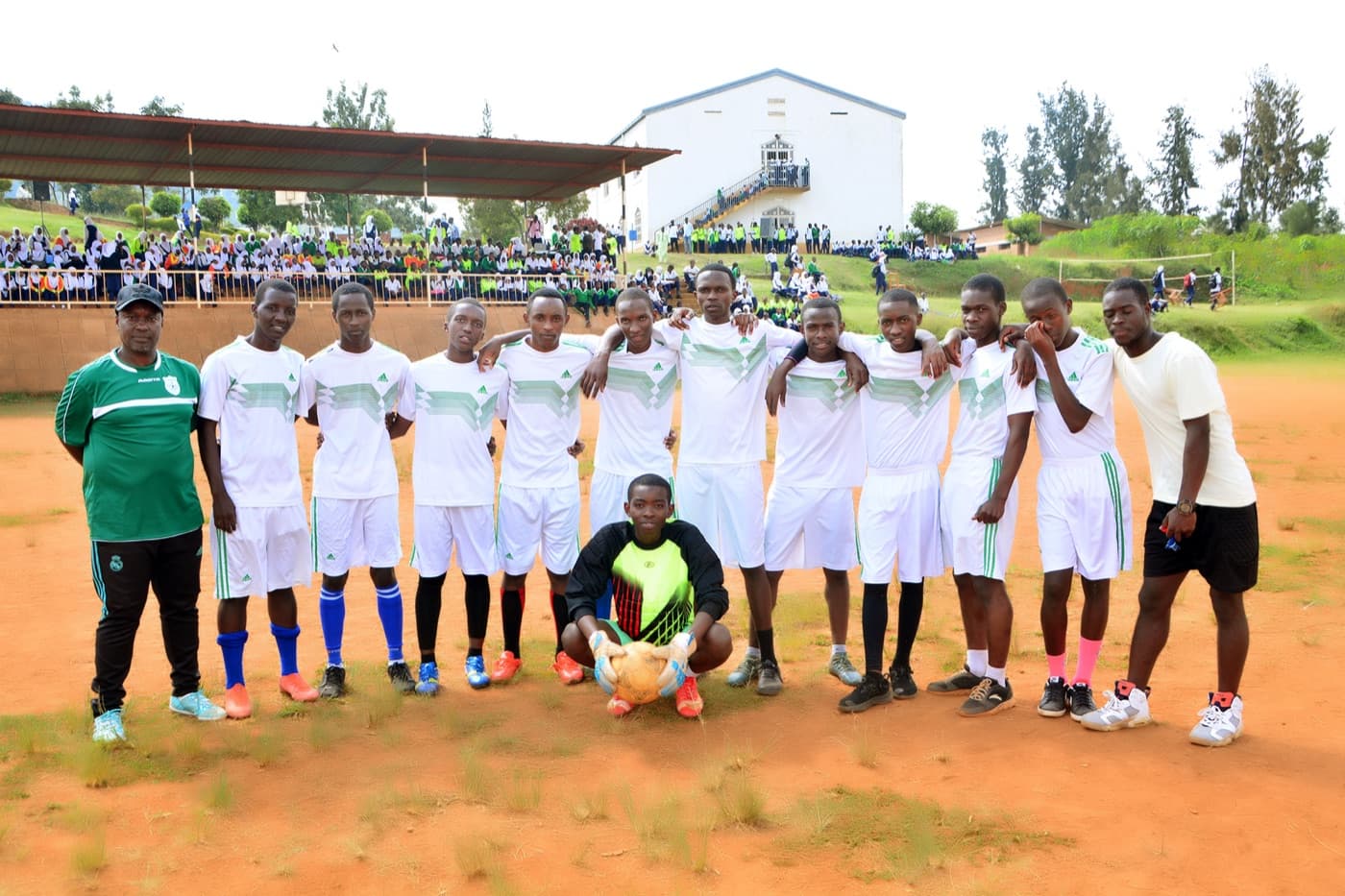 The ESSI Nyamirambo football team on the sports field