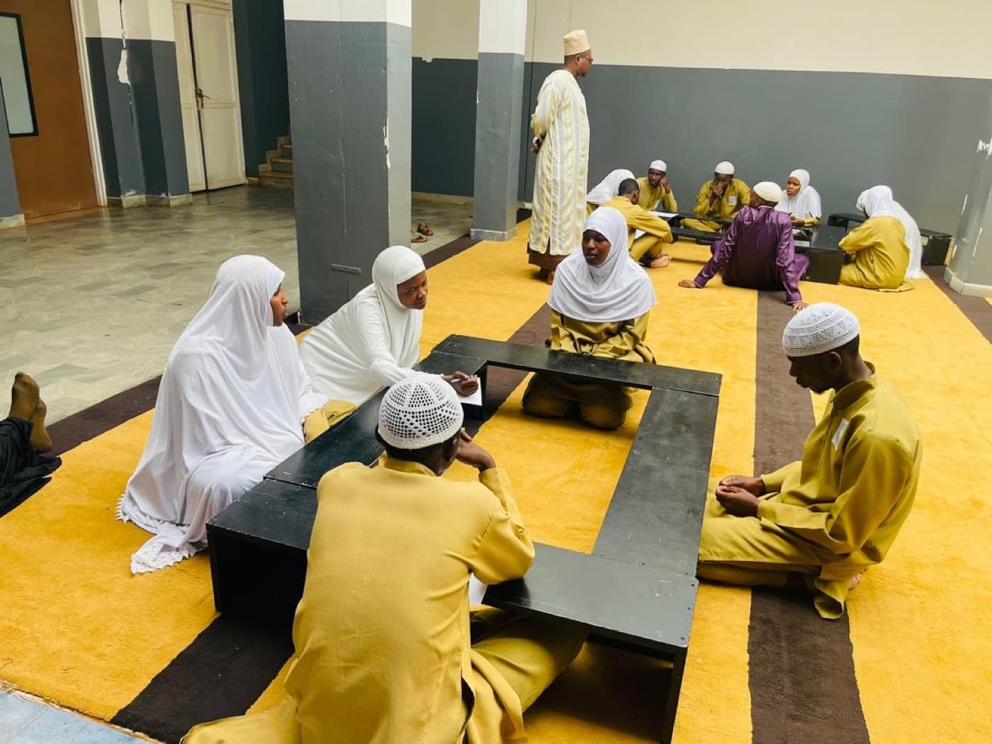 Students in a Qur'an study circle at ESSI Nyamirambo